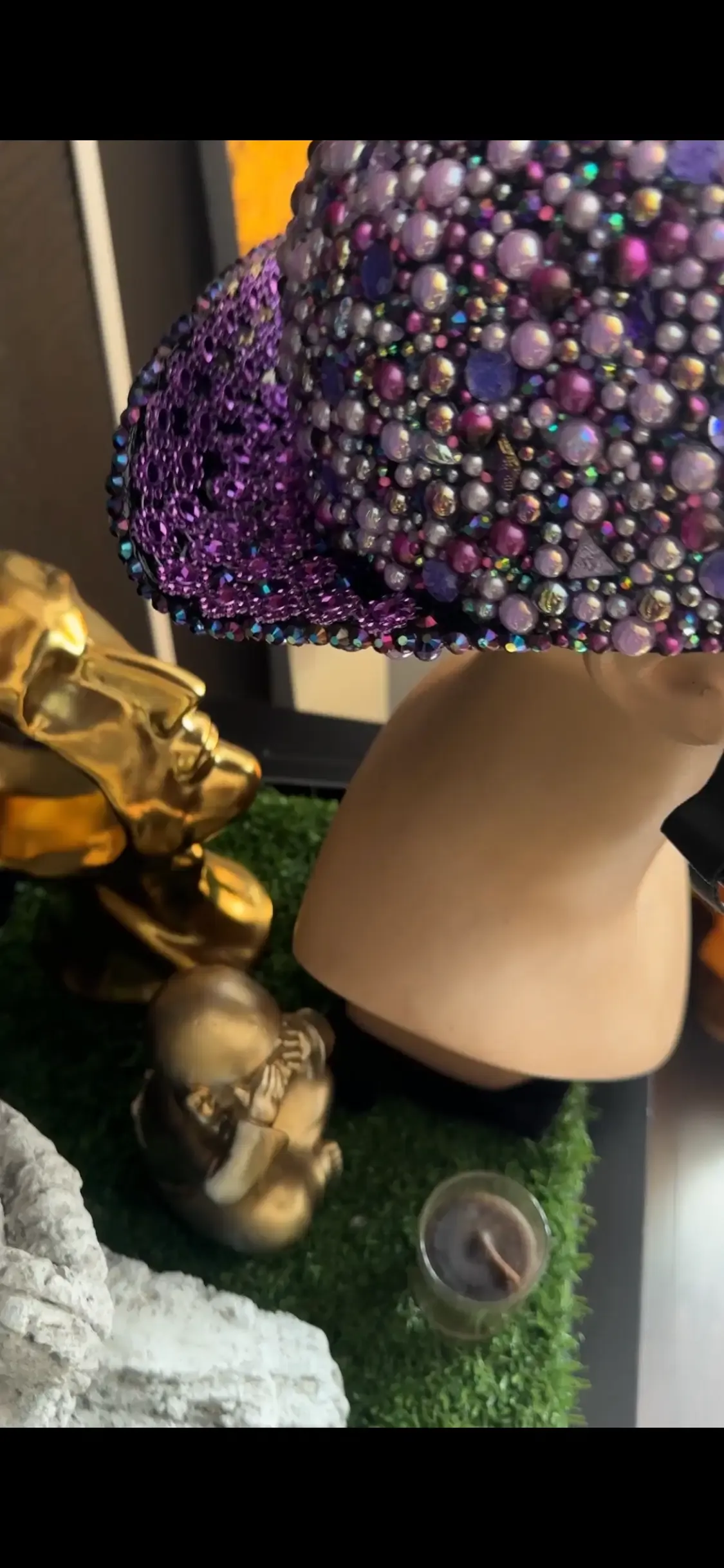 Original photo of the purple crystal-embellished Mikes Lid ball-cap helmet with an extended jeweled bill